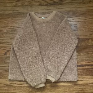 I bought this from Zara, the kids collection! it fits young young adults too!